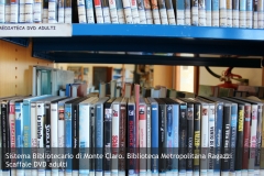 Sistema Bibliotecario di Monte Claro - Biblioteca Metropolitana Ragazzi. Scaffale DVD adulti